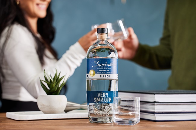 Woman drinking the best tequila for social events